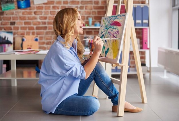 Woman Painting on Canvas